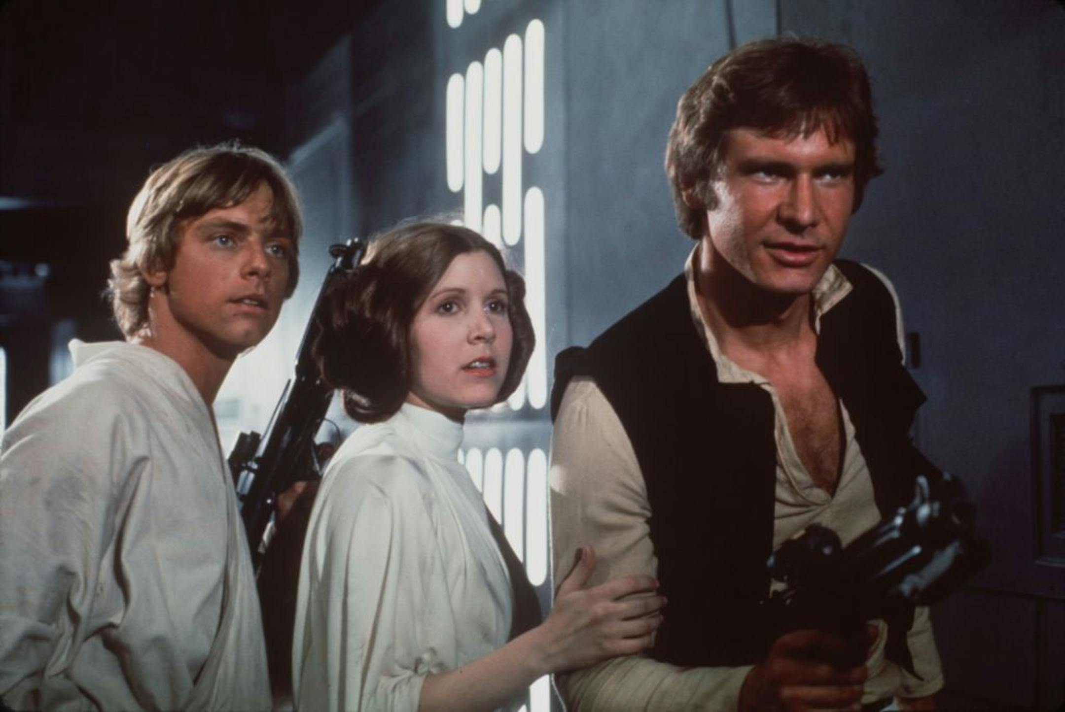 Mark Hamill, left, Carrie Fisher, center, Harrison Ford, right, in a scene from the 1977 movie "Star Wars."
