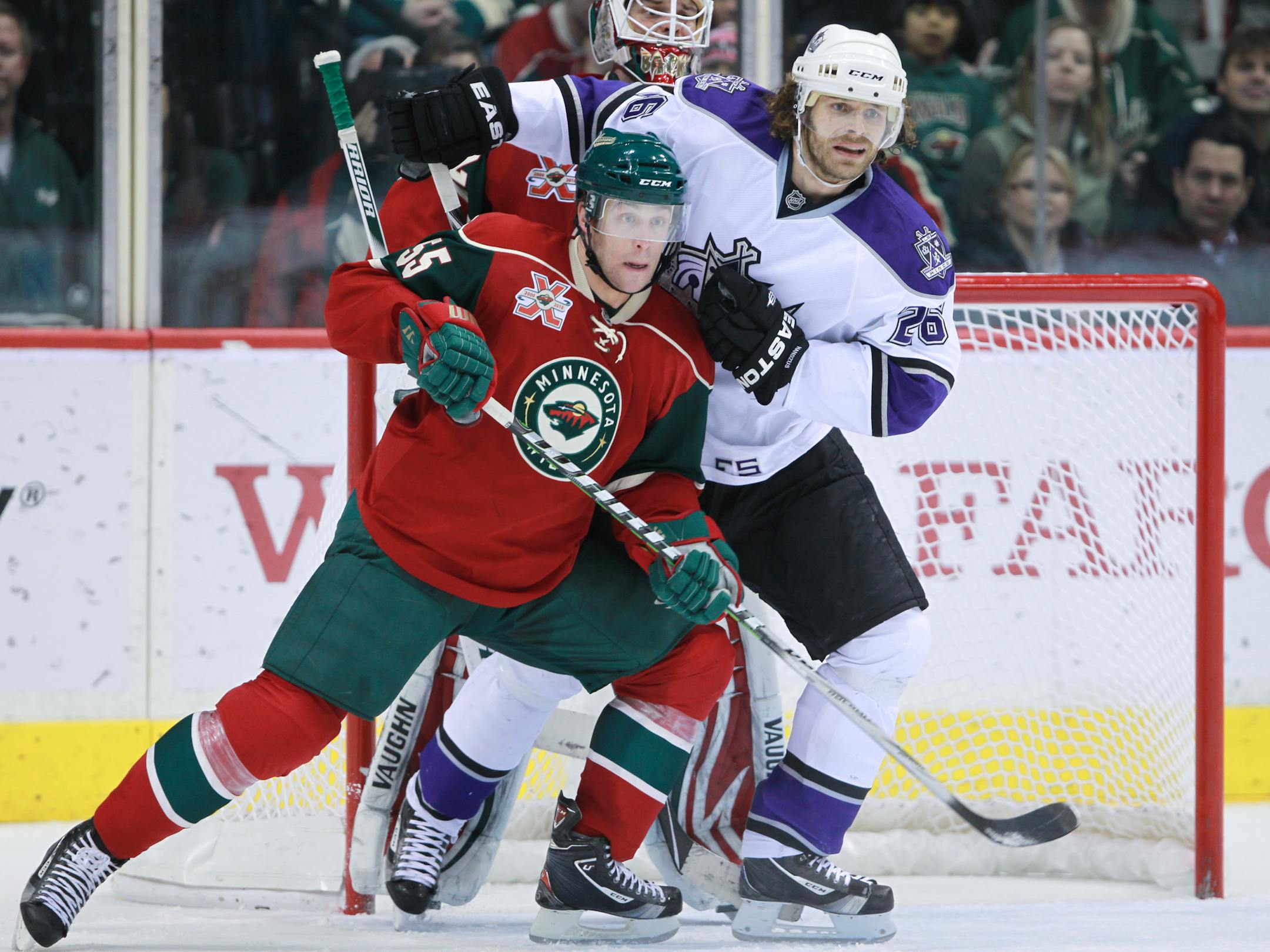 File: In this 2010 photo, Minnesota's Nick Schultz defended the Kings' Michal Handzus