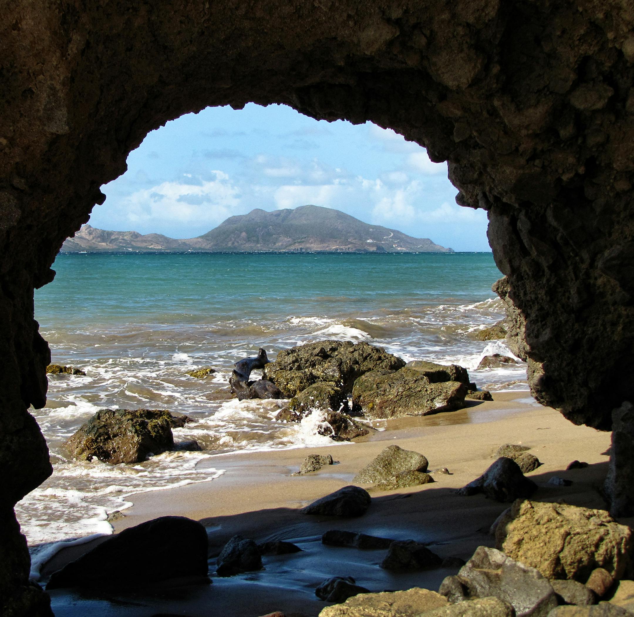 A view of St. Kitts from a quiet beach on the leeward side of Nevis; Nevis is six miles wide by eight miles long, the smaller of the sister islands that make up the Federation of St. Kitts and Nevis, former British colonies. Illustrates TRAVEL-NEVIS (category t), by Necee Regis, special to The Washington Post. Moved Tuesday, October 22, 2013. (MUST CREDIT: Photo by Necee Regis for The Washington Post.)