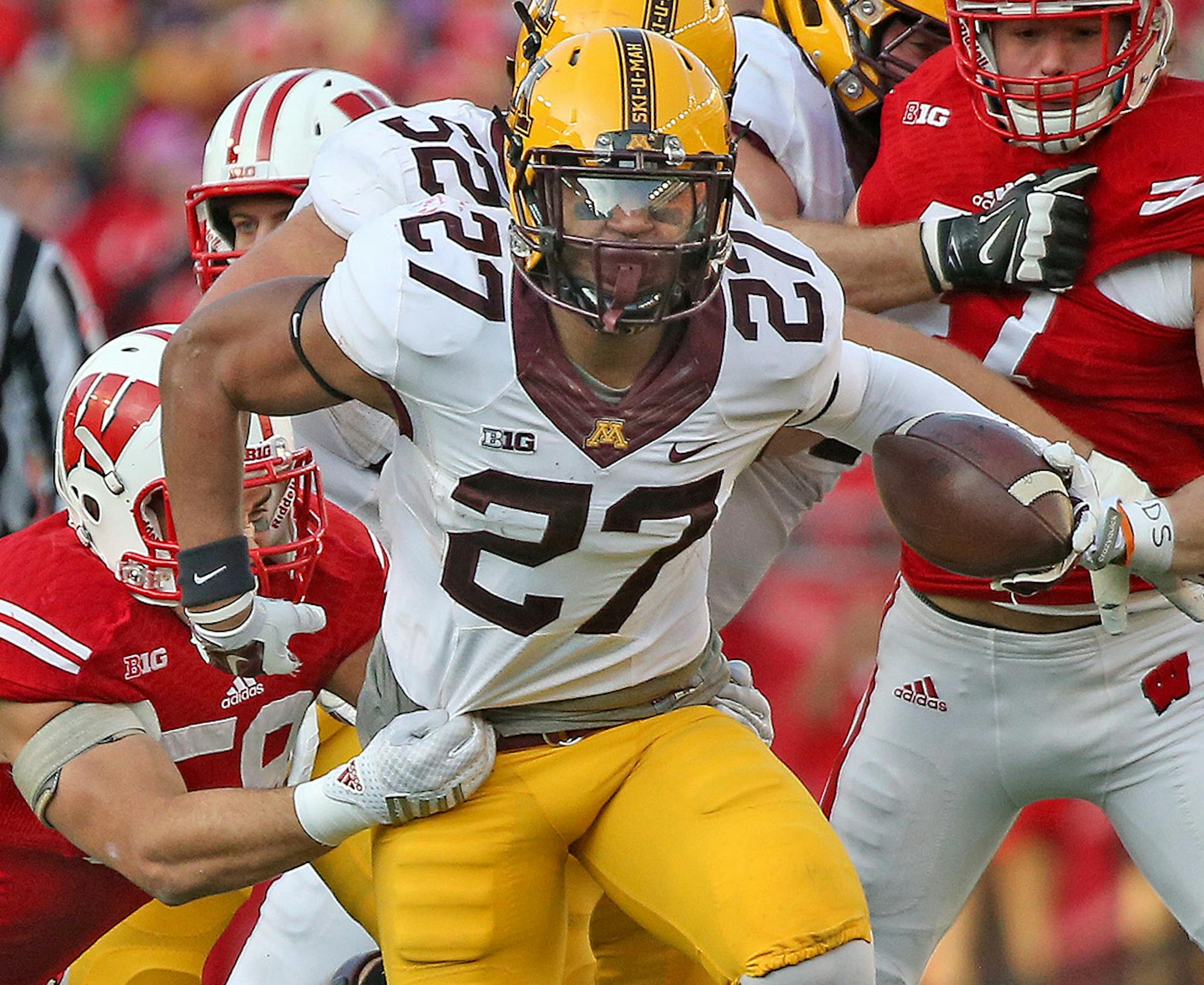 Minnesota's running back David Cobb (27) ran for record yards in the first quarter as the Minnesota Gophers took on the Wisconsin Badgers at Camp Randall Stadium, Saturday, November 29, 2014 in Madison, Wis. ] (ELIZABETH FLORES/STAR TRIBUNE) ELIZABETH FLORES • eflores@startribune.com