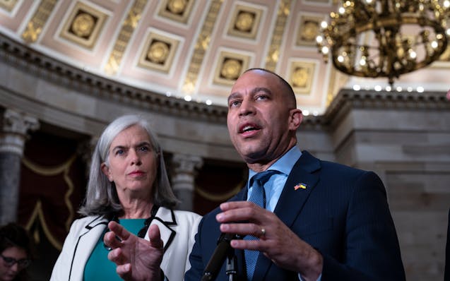 House Minority Leader Hakeem Jeffries, D-N.Y., center, joined at left by Rep. Katherine Clark, D-Mass., the Democratic whip, speaks to reporters about