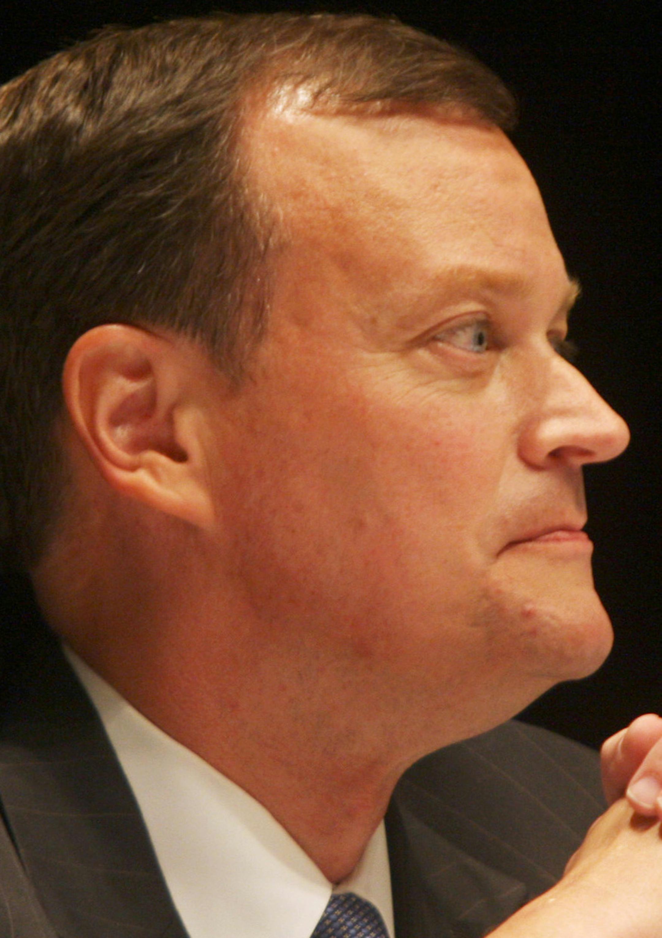 Gubernatorial candidate Jeff Johnson looks on during a Minnesota gubernatorial debate at the Mayo Civic Center in Rochester, Minn., Wednesday, Oct. 1, 2014. The strength of Minnesota's economy put Democratic Gov. Mark Dayton and Republican nominee Jeff Johnson at odds Wednesday night in an opening debate that also saw skirmishes over health care and transportation. (AP Photo/The Rochester Post-Bulletin, Elizabeth Nida Obert)