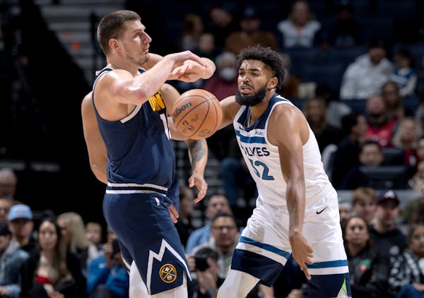 Cold-shooting KAT finds another way to help Wolves thump Nuggets