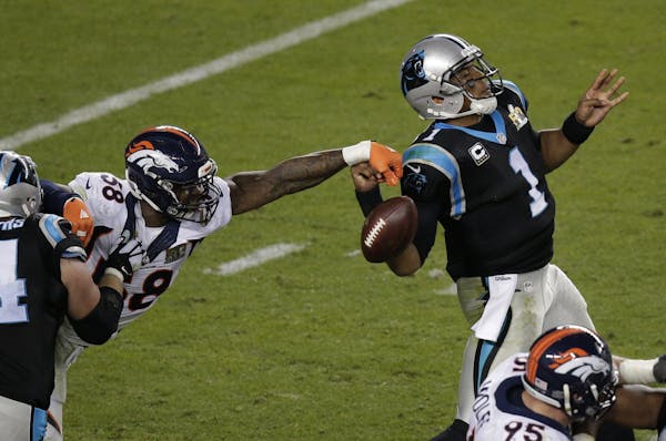 The Broncos' Von Miller (58) stripped the ball from Panthers quarterback Cam Newton during the second half of Denver's 24-10 victory in Super Bowl 50 