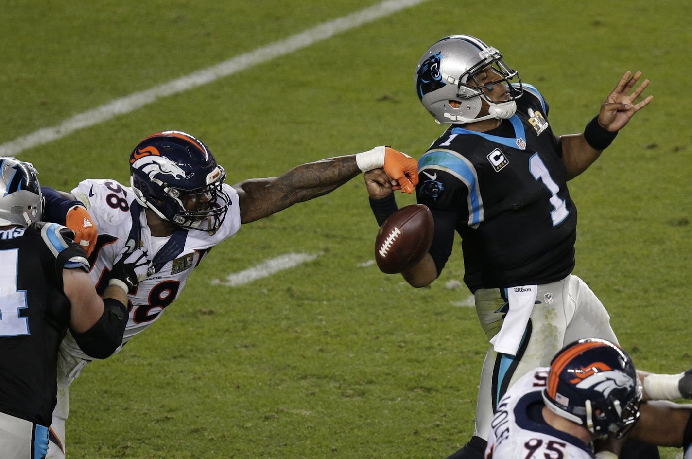 The Broncos' Von Miller (58) stripped the ball from Panthers quarterback Cam Newton during the second half of Denver's 24-10 victory in Super Bowl 50 on Sunday.