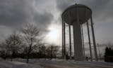 Golden Valley main water tower, photographed on 2/5/14. Golden Valley, Crystal and New Hope residents came within an hour of running out of tap water last summer when a storm knocked out water pump power and a major watermain exploded in Robbinsdale. We came within minutes of no water, said Golden Valley Mayor Shep Harris. The narrowly escaped tri-city drought highlighted the lack of a water backup plan, an issue the three cities had discussed for at least five years. Last month, a $4 million ba