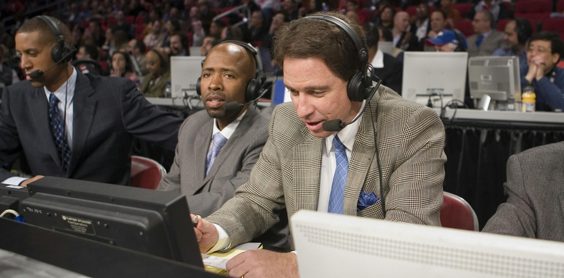 Kevin Harlan, second from right, and the TNT television broadcast crew. (from left, Reggie Miller, Kenny Smith, Harlan and unknown)