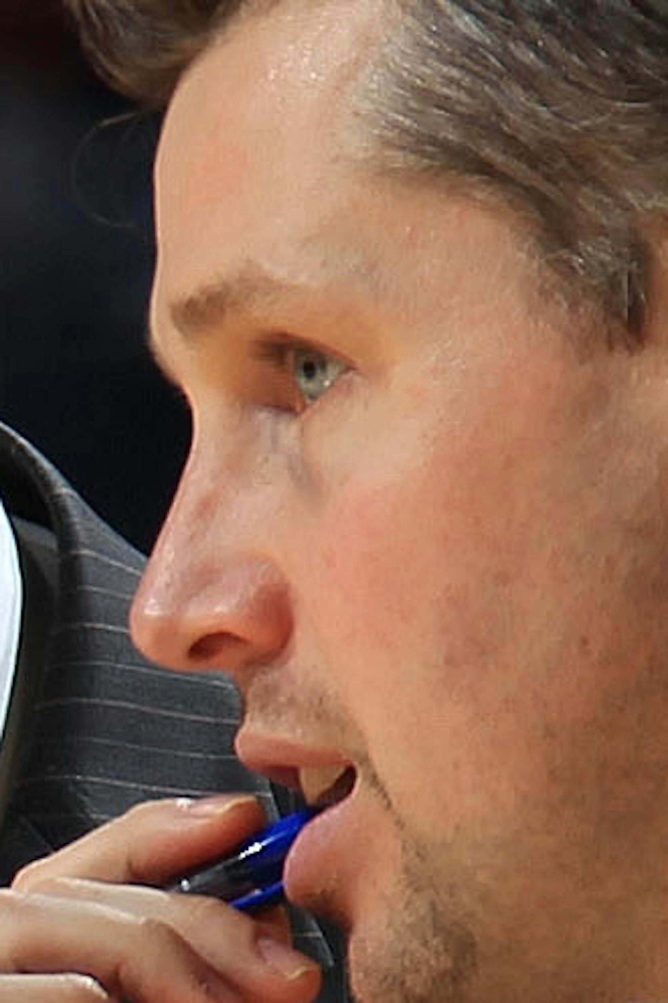 In this photo taken Dec. 8, 2012, Memphis Grizzlies assistant coach David Joerger, right, talks with head coach Lionel Hollins during an NBA basketball game in Memphis, Tenn. The Grizzlies are negotiating with Joerger to become the team's new head coach, said a person familiar with the situation. The person spoke to The Associated Press Tuesday, June 25, 2013, on condition of anonymity because the final deal hasn't been reached yet. (AP Photo/The Commercial Appeal, Nikki Boertman, File)
