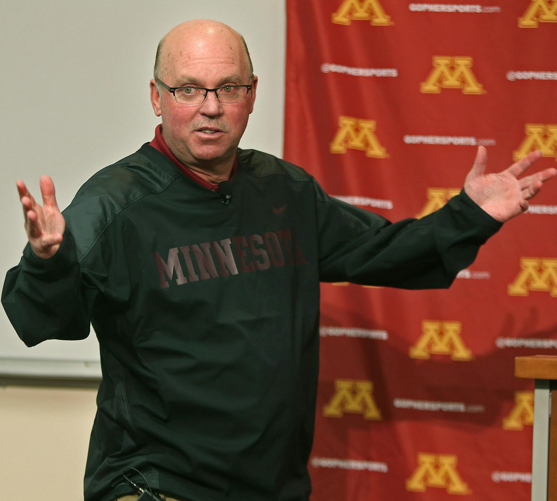 The University of Minnesota football coach Jerry Kill speaks to the media during a news conference on campus regarding his raise, and spring football, Monday, Feb. 24, 2014 in Minneapolis, Minn. Kill says he's "getting paid way too much" to be Minnesota's coach but appreciative of the raise and contract extension he received. (AP Photo/The Star Tribune, Elizabeth Flores)