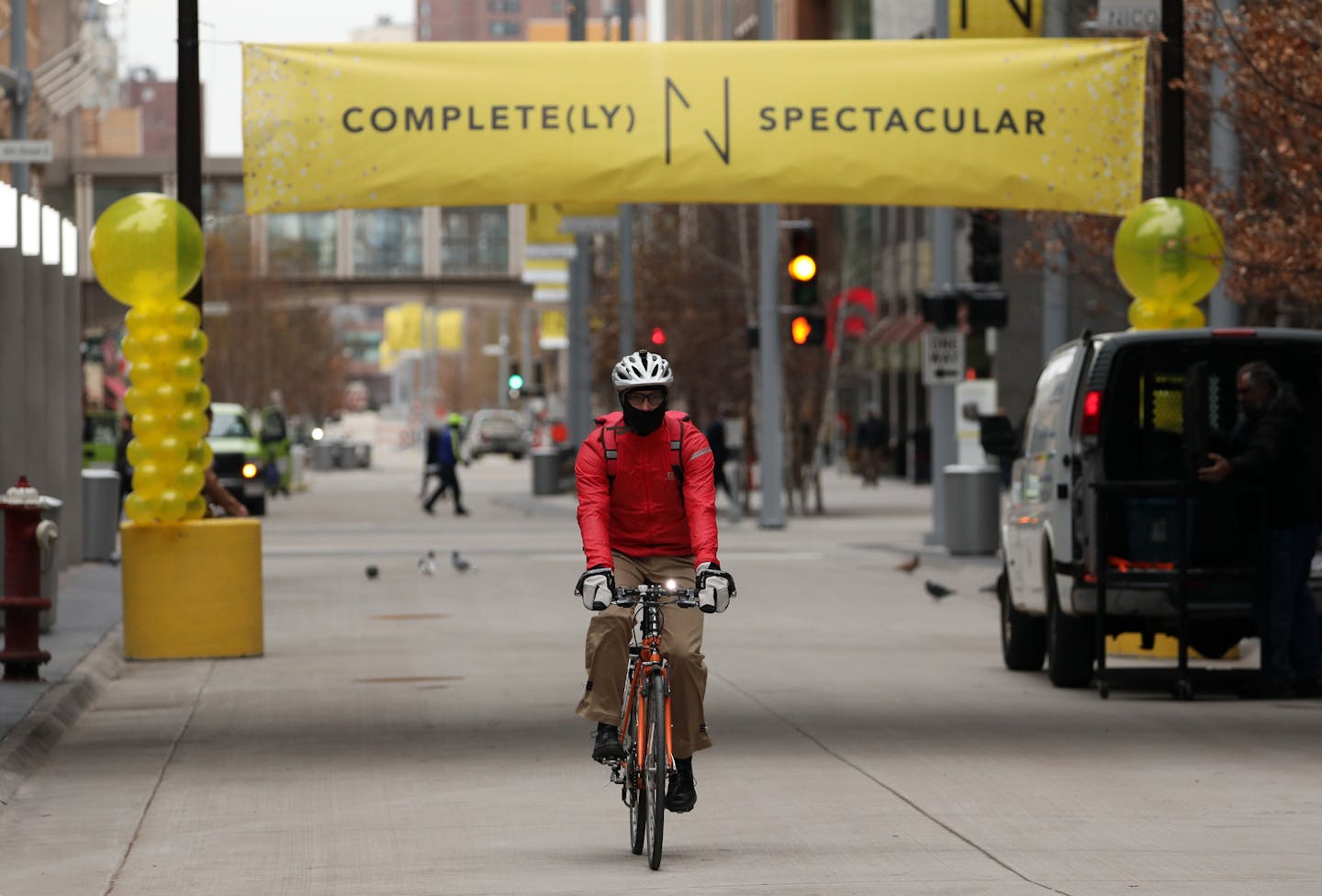 A cyclist rode down the middle of the street following a dedication ceremony to mark the opening of the newly renovated Nicollet Mall Thursday. ] ANTHONY SOUFFLE &#xef; anthony.souffle@startribune.com Mayor Betsy Hodges, Steve Cramer and others spoke during a ceremony to mark the reopening of Nicollet Mall Thursday, Nov. 16, 2017 in downtown Minneapolis.