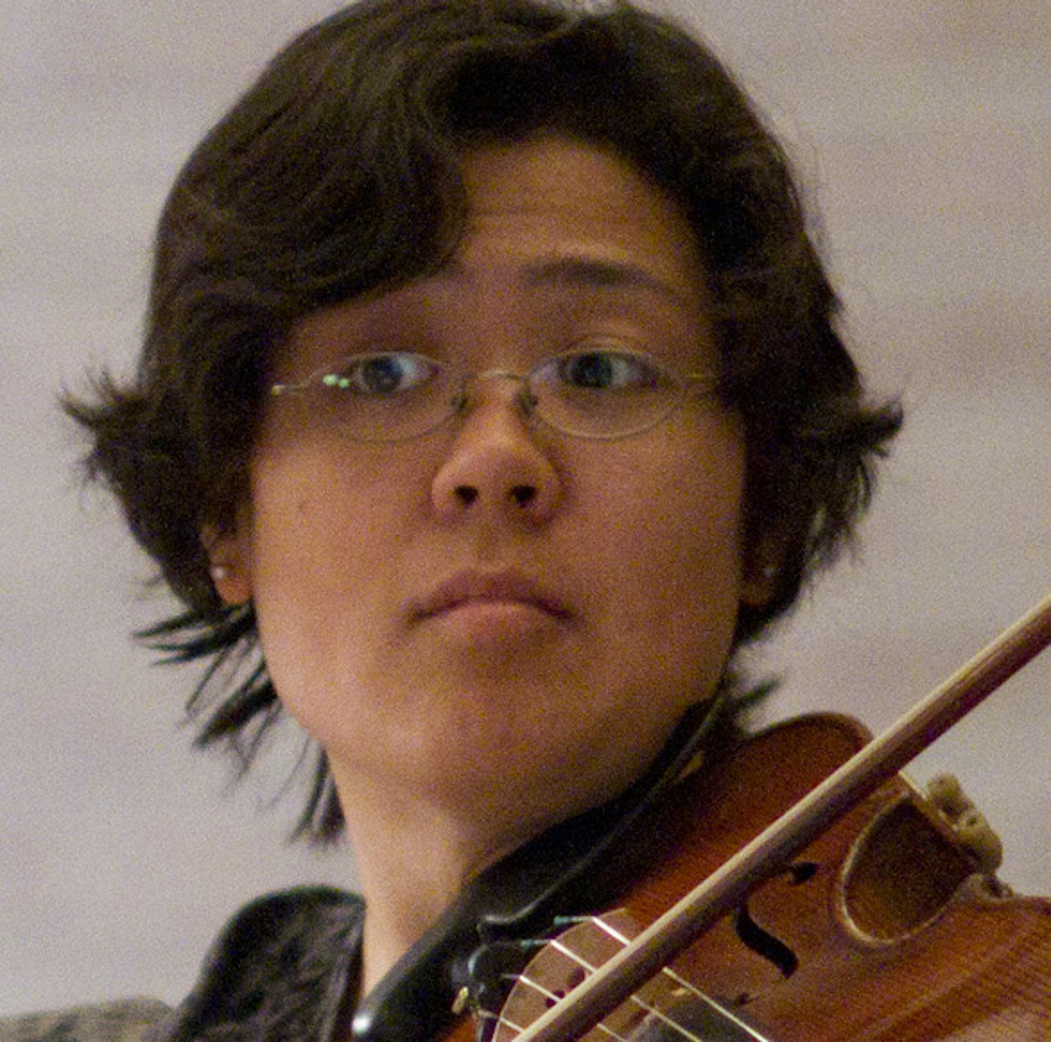 With two major orchestras in the Twin Cities to draw talent from, it's no surprise that there is a burgeoning scene for chamber ensembles. Accordo, one of the better known groups, performed Monday night, March 12, 2012 as part of their series at Christ Church Lutheran in south Minneapolis. Violist Maiya Papach and Ruggero Allifranchini touched up a piece at Christ Church Lutheran before the ensemble's concert there Monday night. Papach is acting principal viola of The Saint Paul Chamber Orchestr