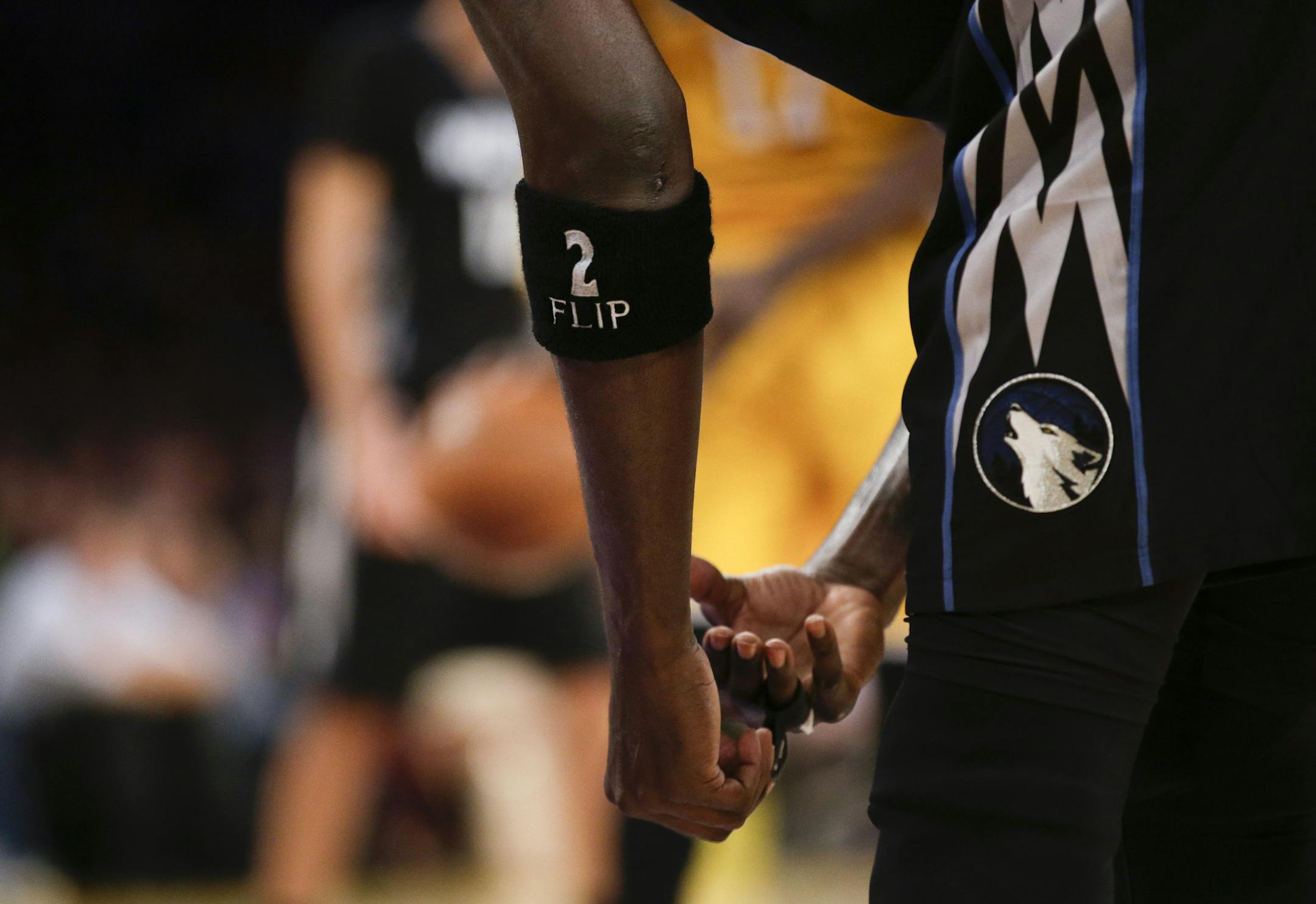 Minnesota Timberwolves' Kevin Garnett wears a special armband in honor of Flip Saunders passing during an NBA basketball game with the Los Angeles Lakers, Wednesday, Oct. 28, 2015, in Los Angeles.(AP Photo/Jae C. Hong)