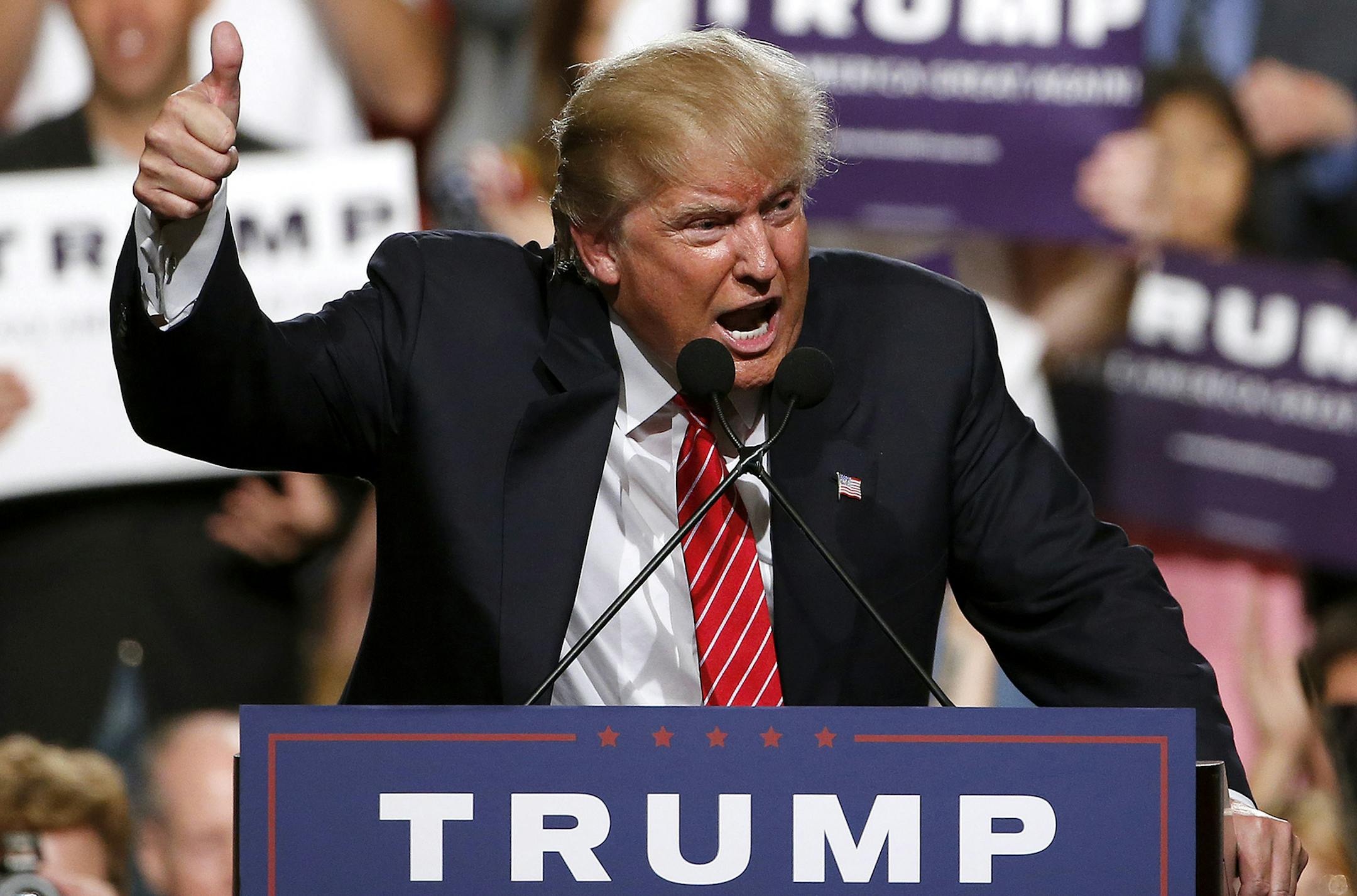 Republican presidential candidate Donald Trump finishes up speaking before a crowd of 3,500 Saturday, July 11, 2015, in Phoenix.