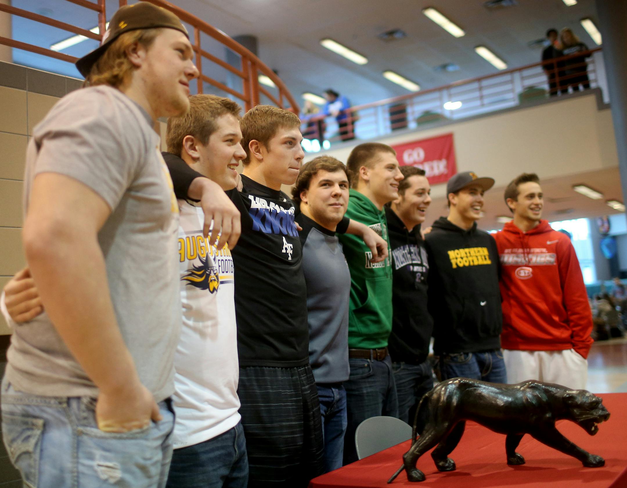 Eight starters from the Lakeville High defense are all headed to play college football and were seen during signing at Lakeville North High Wednesday, Feb. 4, 2015, in Lakeville, MN. Among the players is Boyd Draeger, headed to the University of Wyoming; Jordan Cardenas, Augustana; Tristyn Hanson, Air Force; Connor Melz, Southwest State; Carl Engwall, University of North Dakota; Jesse Cardenas, Northern Iowa; Dakota Toedter, Northern State and Stu Hamman, St. Cloud State.](DAVID JOLES/STARTRIBUN