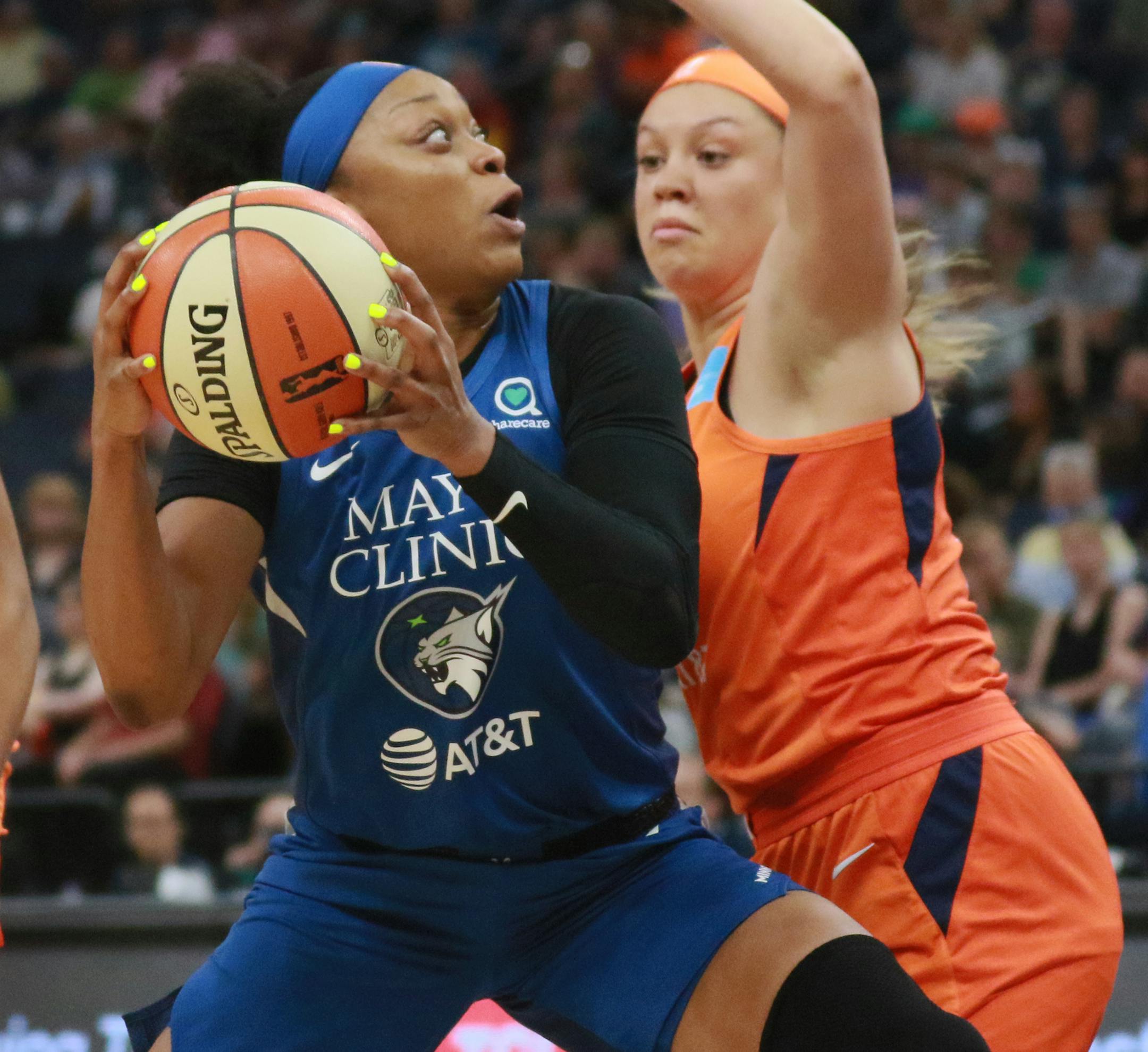 The Minnesota Lynx's Odyssey Sims (1) drives to the basket against former University of Minnesota star Rachel Banham (1), now a member of the Connecticut Sun, during the first half Friday, June 14, 2019, at the Target Center in Minneapolis, MN.] DAVID JOLES • david.joles@startribune.com Connecticut Sun at Minnesota Lynx at Target Center