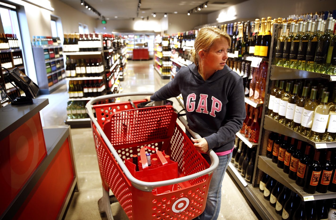 Kristine Welle shops for alcohol at the first Super Target in Minnesota to sell alcohol in Otsego, Minn.