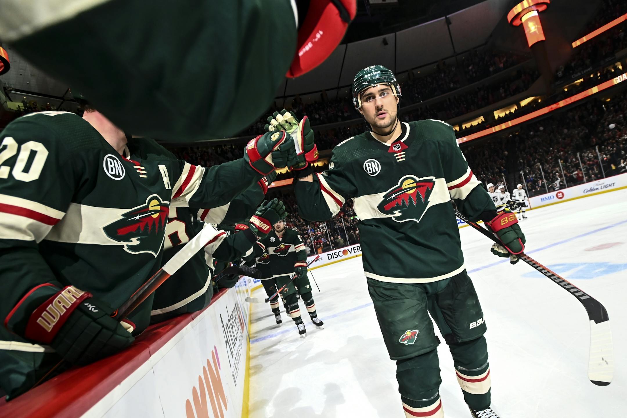 Minnesota Wild right wing Nino Niederreiter (22) celebrated with teammates after scoring a goal against the Los Angeles Kings in the second period.