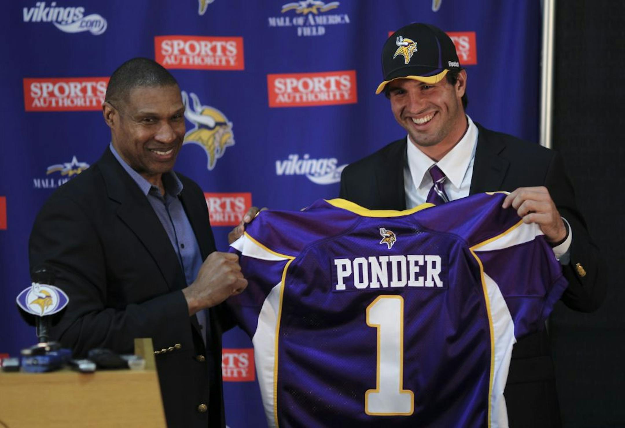 Vikings head coach Leslie Frazier and the team's first round draft choice, Christian Ponder, the Florida State quarterback, posed with a team jersey at the start of a news conference in 2011.
