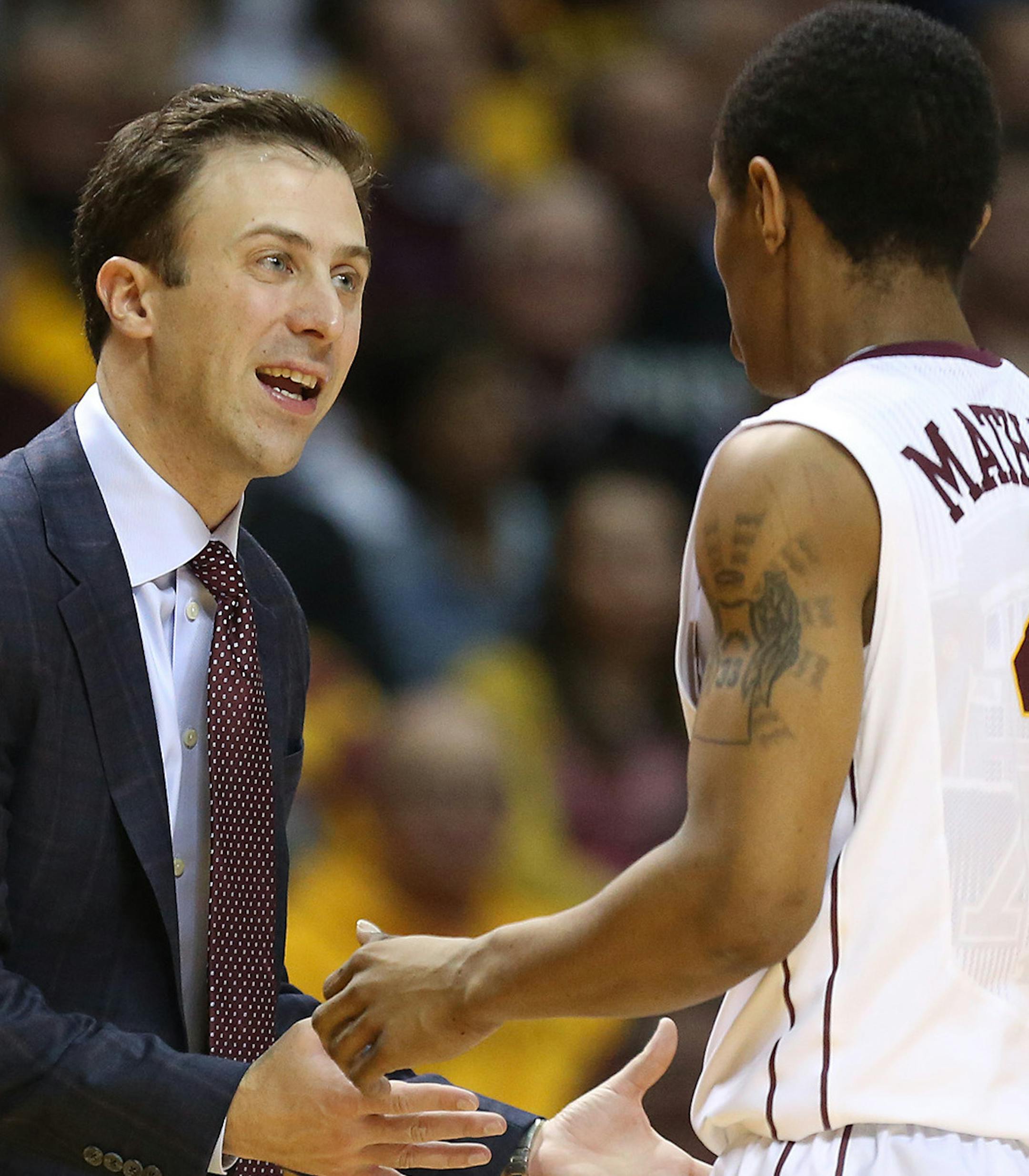 Gopher head coach Richard Pitino talked with player DeAndre Mathiue during a timeout during the first half. ] (KYNDELL HARKNESS/STAR TRIBUNE) kyndell.harkness@startribune.com Gophers vs Northwestern at Williams Arena in Minneapolis, Min., Wednesday, February 18, 2015.