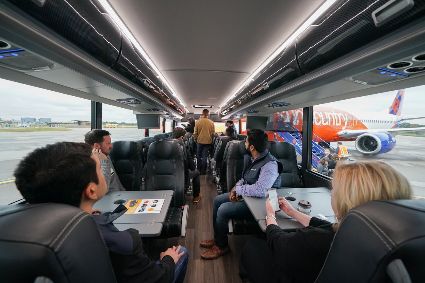 The interior of a Landline bus. Sun Country Airlines showed off its new design for the exterior of its planes, its new partnership with Landline and new headquarters built in a former hangar. ] GLEN STUBBE &#x2022; glen.stubbe@startribune.com Tuesday, October 15, 2019 Sun Country Airlines media day, to include Q&A with CEO jude bricker, update on its new technology system and partnership announcements. Visuals: tour of its new headquarters/office in a renovated airport hangar PLUS outdoor shots