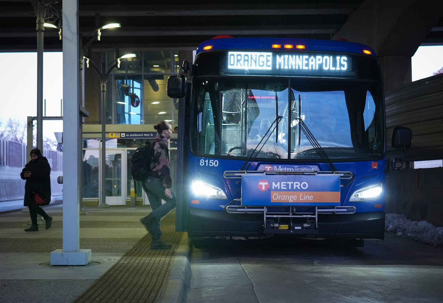 The Orange Line rapid bus arrives at the I-35 and 46th Street station for the morning commute in Minneapolis, Minn., on Friday, April 7, 2023.