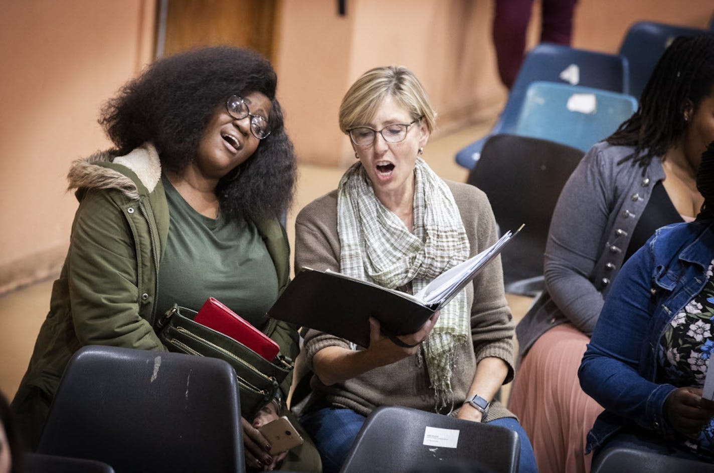 South African soprano Goitsemang Lehobye, left, sings with Maya Tester of the Minnesota Chorale. ] LEILA NAVIDI &#xef; leila.navidi@startribune.com BACKGROUND INFORMATION: The Minnesota Chorale and South Africa-based choir Gauteng Choristers come together for rehearsal for the first time at the University of the Witwatersrand in Johannesburg on Tuesday, August 13, 2018.