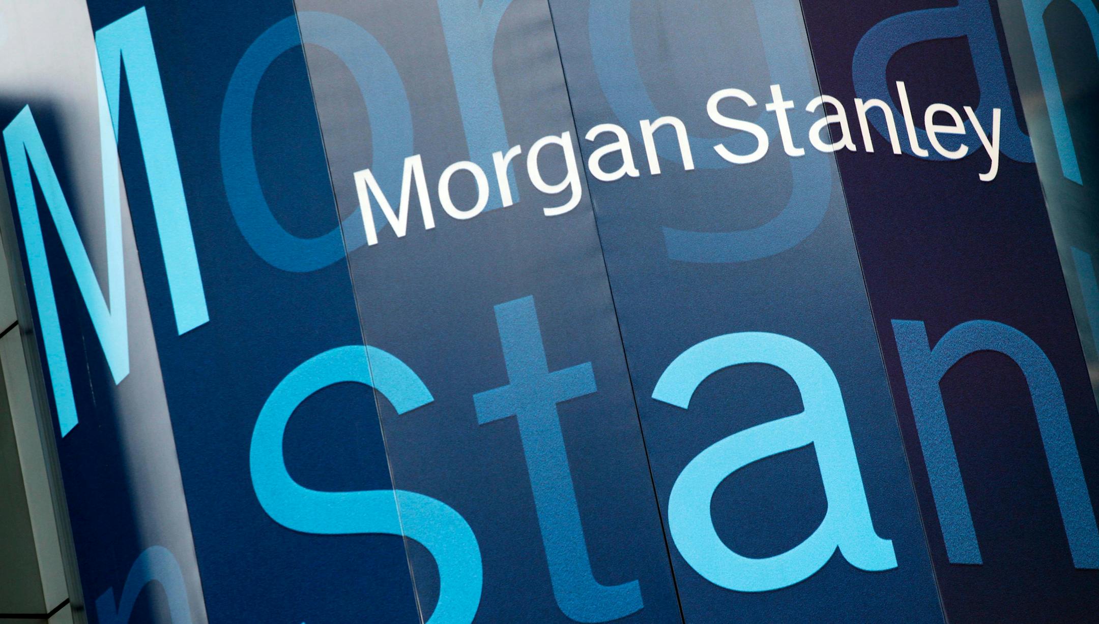 FILE - In this Oct. 18, 2011, file photo, the Morgan Stanley logo is displayed on its Times Square building, in New York. Morgan Stanley is buying online brokerage E-Trade in an all-stock deal valued at about $13 billion. In the all-stock deal announced Thursday, Feb. 20, 2020, E*Trade shareholders will receive 1.0432 Morgan Stanley shares for each share they own. (AP Photo/Mark Lennihan, File)