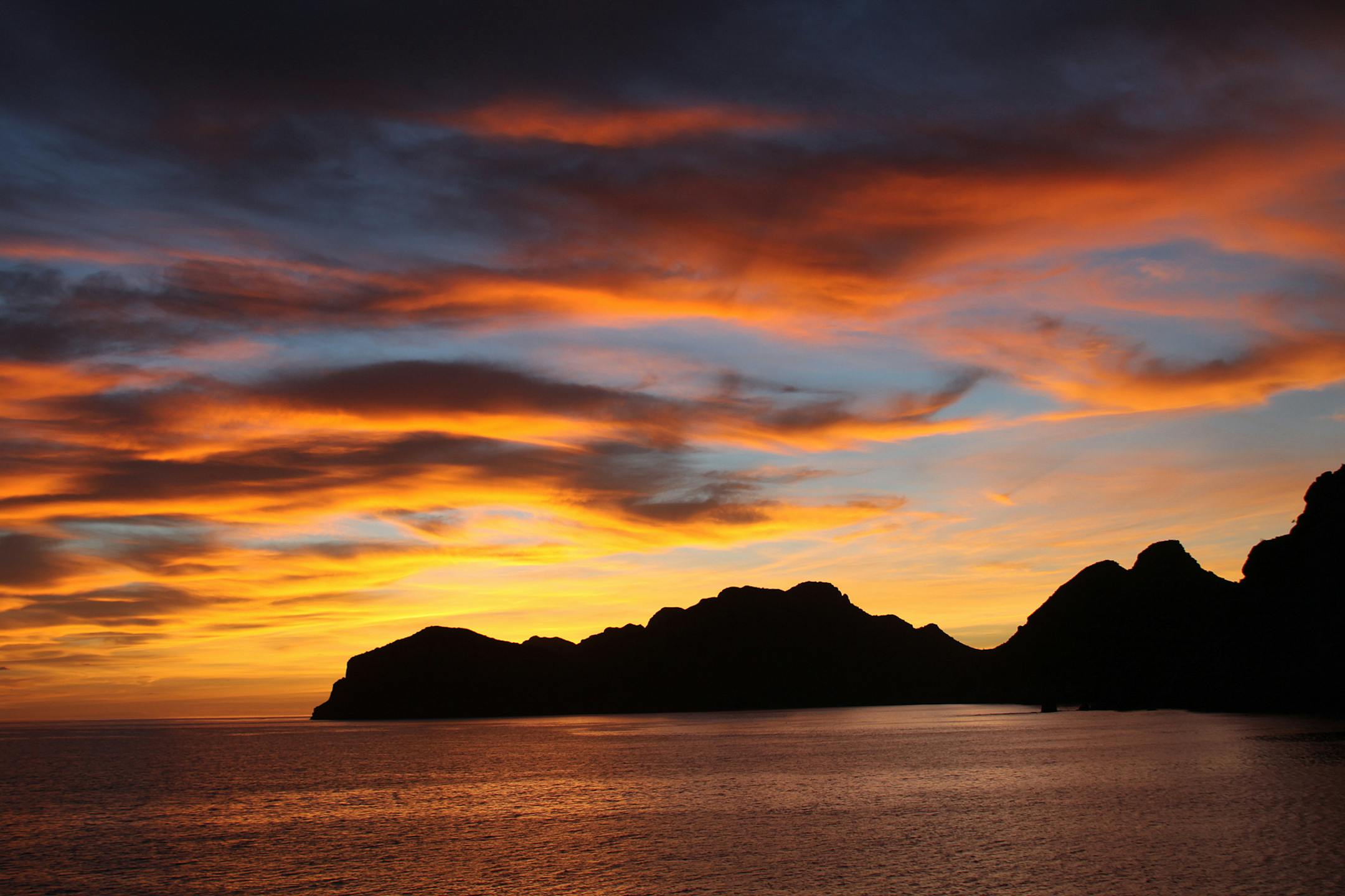 Most mornings on board started with spectacular sunrises, like this one over Bahia Agua Verde.