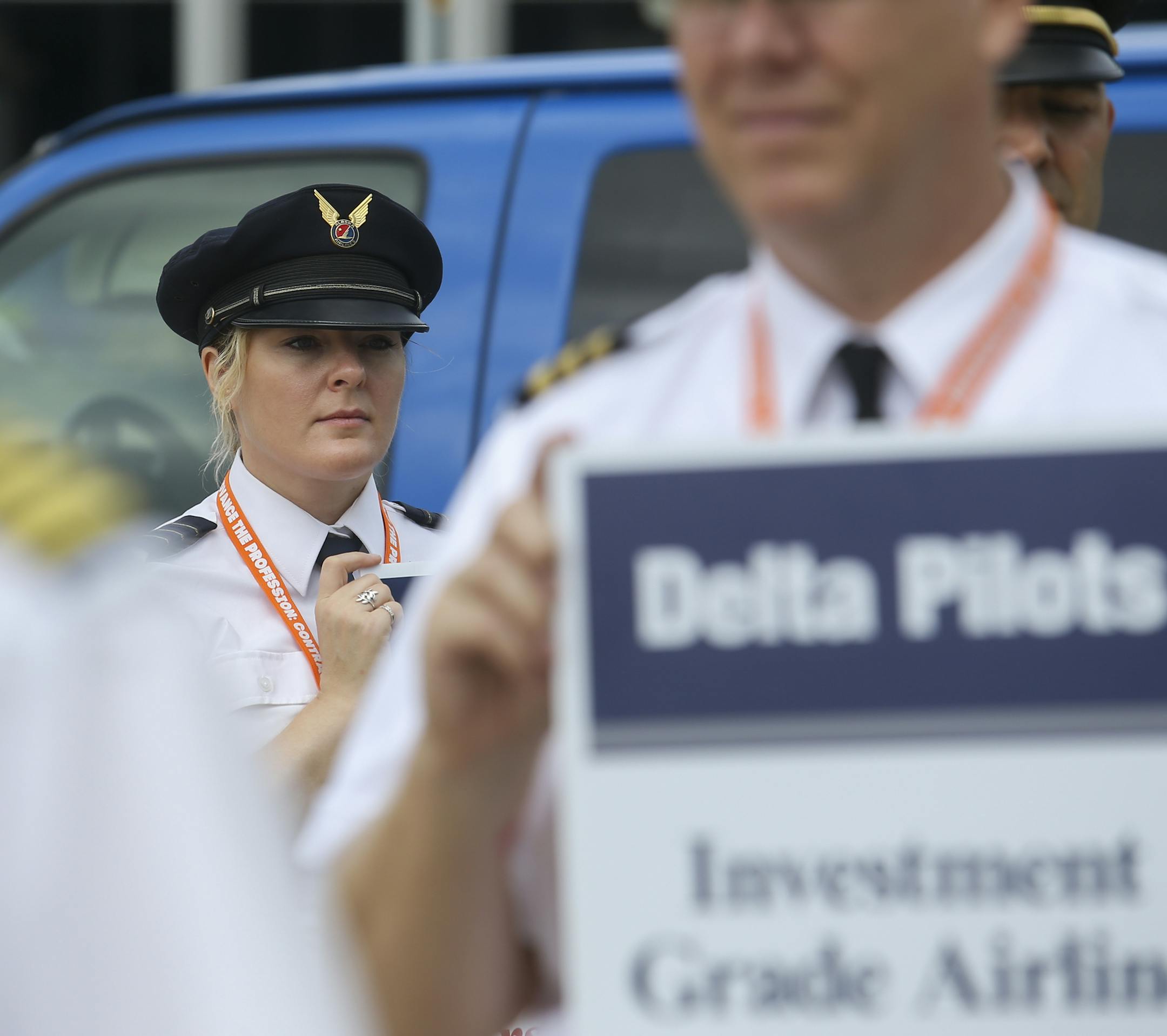 A member of Alaska Air Lines marches in solidarity with pilots form Delta Air Lines. ] Timothy Nwachukwu &#x2022; timothy.nwachukwu@startribune.com Pilots from Delta Air Lines picketed outside Terminal 1 of Minneapolis&#x2013;Saint Paul International Airport on Friday, June 24, 2016. Pilots were protesting in order to raise awareness of a lack of salary increases and negotiations between the pilots' union and the company since talks began on March 31, 2016.