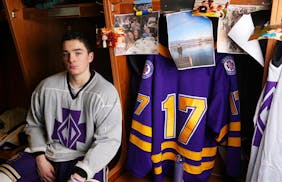 Colin Scanlan, whose younger brother Cormick died on Christmas Day after strokes caused by a rare disease, sits for a portrait near a locker left unch