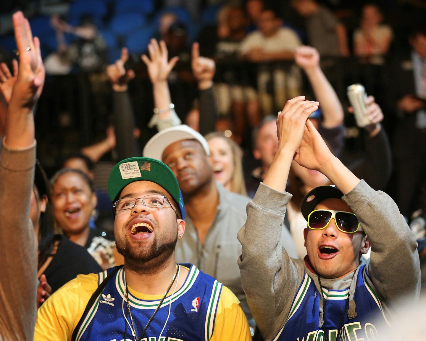 Timberwolves fans Dan Robbins left and Brandon Bazile cheered after Minnesota was award the first pick in the NBA draft during draft lottery pick party at Target Center Tuesday May 19, 2015 in Minneapolis, MN. ] Jerry Holt/ Jerry.Holt@Startribune.com