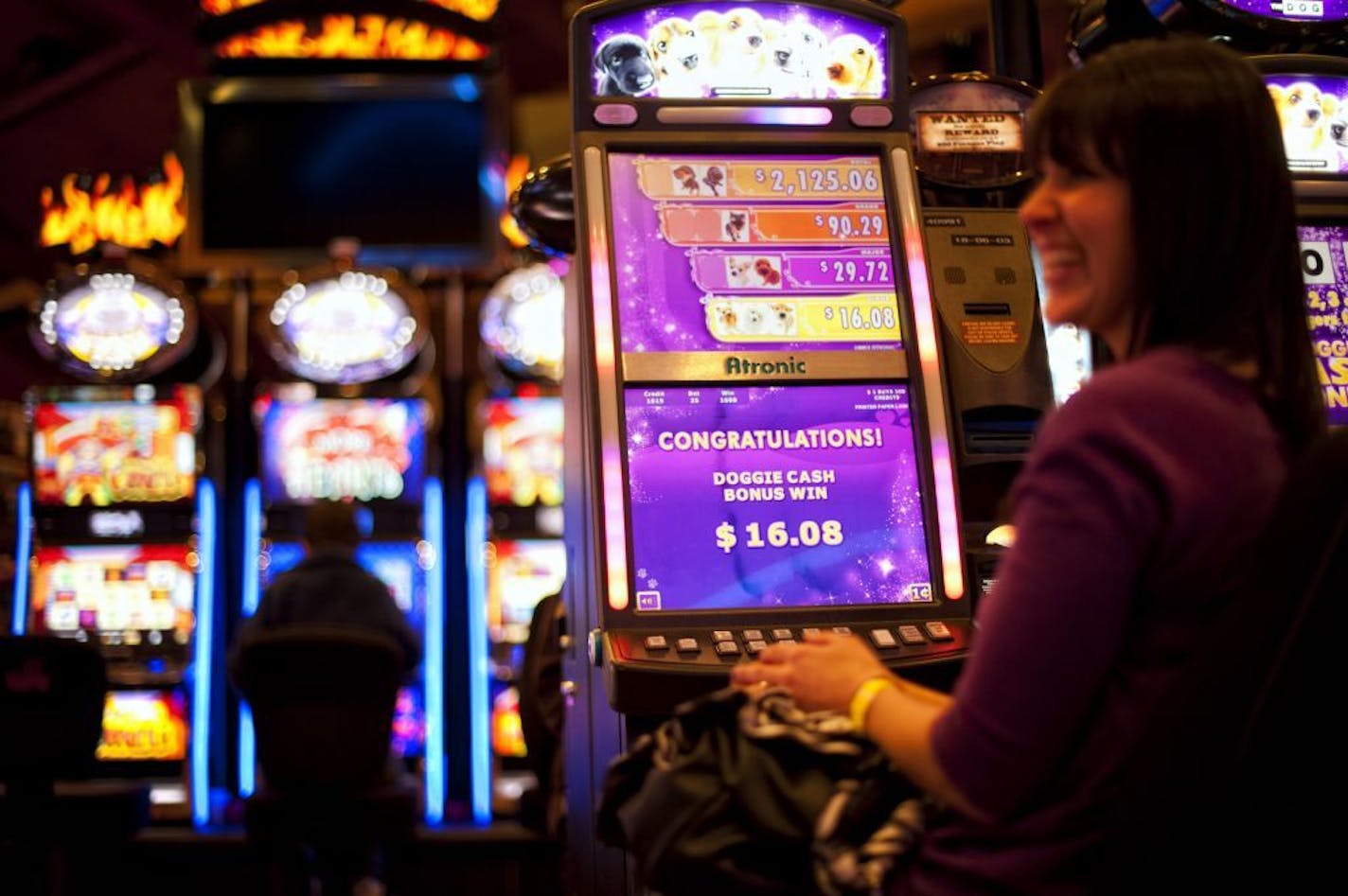 Diane Wheatman of Hibbing laughed when she won a bonus at a puppy-themed slot machine at Fortune Bay Resort Casino in Tower, Minnesota. Thursday, January 12, 2010