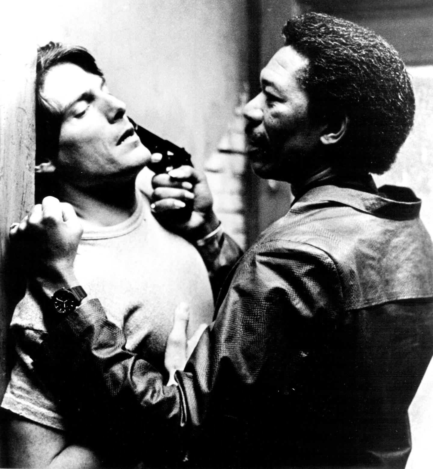 May 20, 1987 Street Smart Fast Black (MORGAN FREEMAN) threatens Jonathan (CHRISTOPHER REVE). THE CANNON GROUP, INC Presents CHRISTOPHER REEVE in a GOLAN-GLOBUS Production of a JERRY SCHATZBERG Film, "STREET SMART" Starring KATHY BAKER. MIMI ROGERS, JAY PATTERSON. ANDRE GREGORY and MORGAN FREEMAN as Fast Black. Director of Photography ADAM HOLENDER, a.s.C Associate Producer EVZEN W KOLAR Written by DAVID FREEMAN Produced by MENAHEM GOLAN and YORAM GLOBUS Directed by JERRY SCHATZBERG Cannon Films,