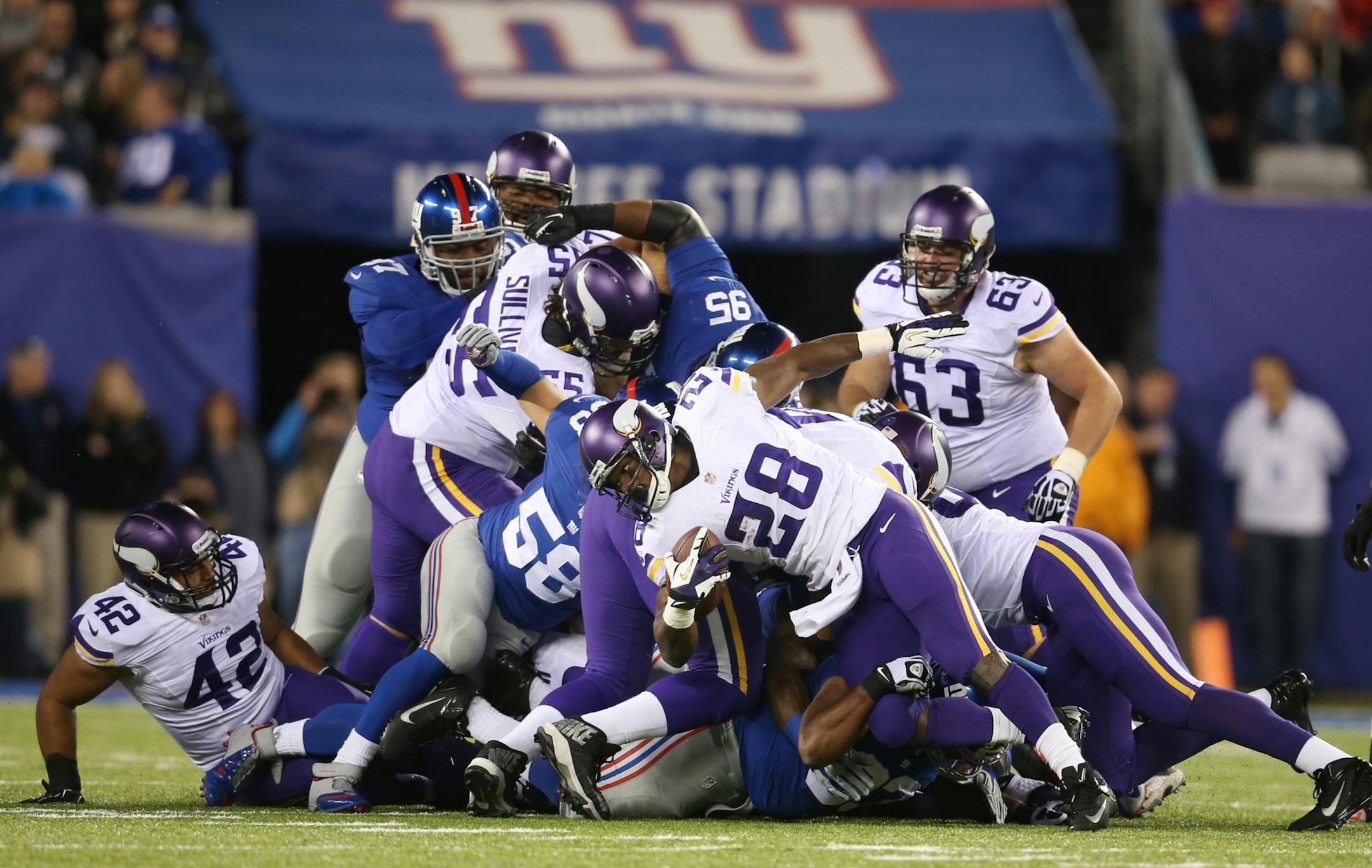 Vikings running back Adrian Peterson was stopped at the line of scrimmage in the second quarter on Monday night.
