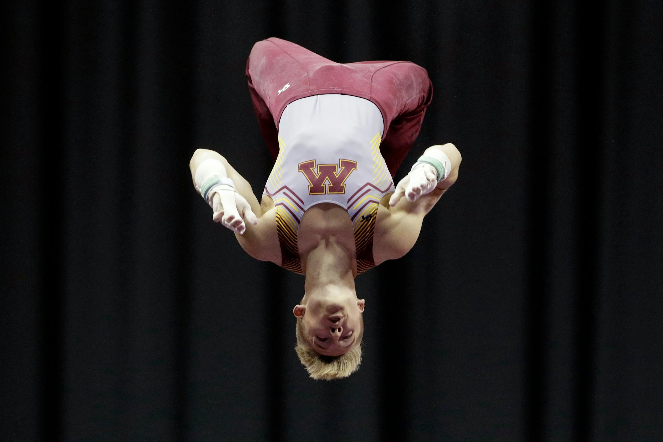 Shane Wiskus competes on the horizontal bar at the U.S. Gymnastics Championships on Saturday in Kansas City