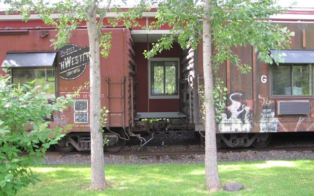 The Northern Rail Traincar Inn boasts 14 guest rooms made from retired boxcars.