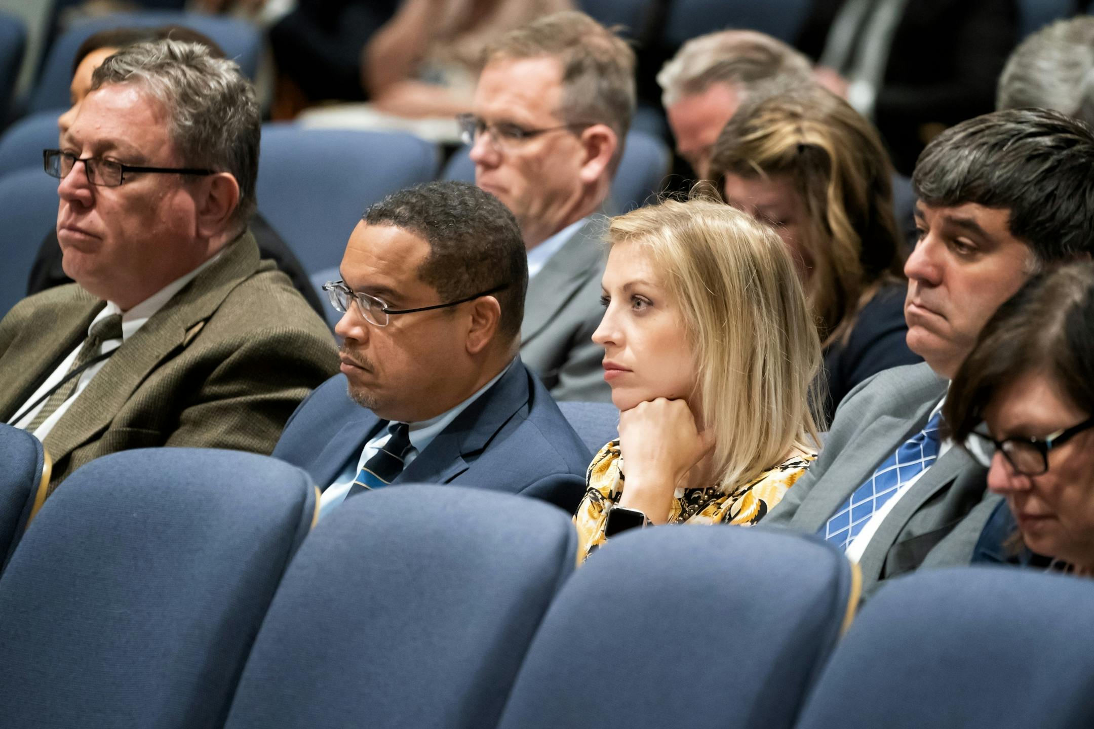 Minnesota Attorney General Keith Ellison and Government Affairs Director Carly Melin waited to speak before the Senate Finance Committee about the omnibus state government bill.