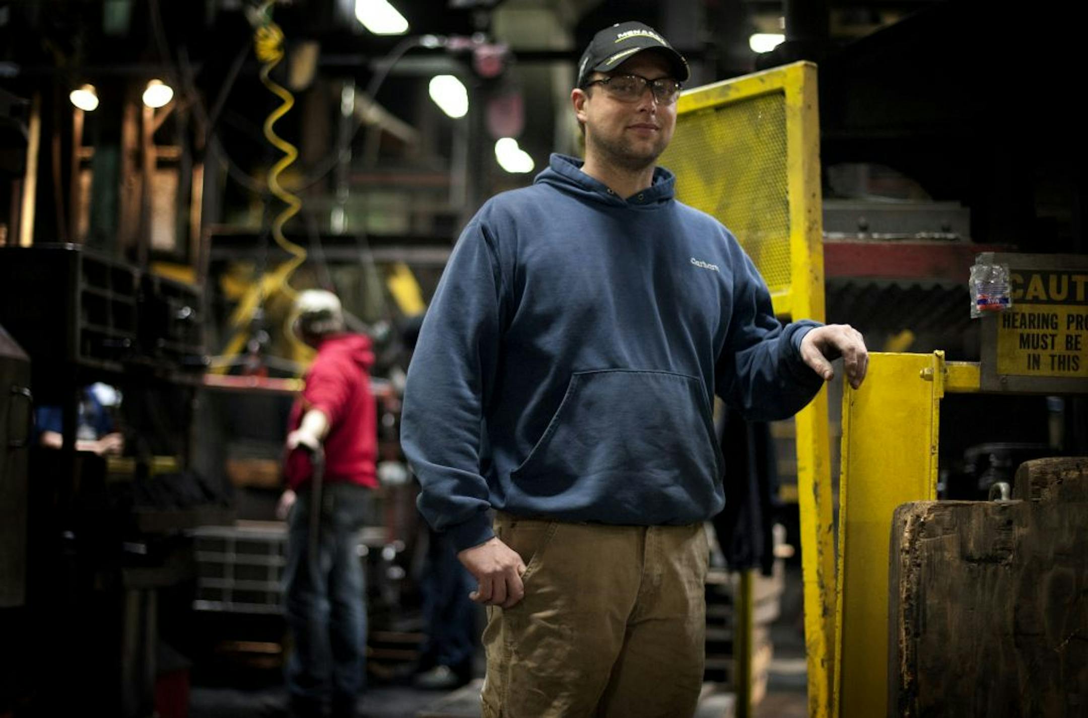Jason Kalmes was recently hired at Badger Foundry in Winona, Thursday, February 16, 2012 where he regularly drives a forklift. The company has been on a hiring spree lately due to an increase in orders.