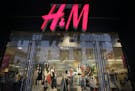 FILE - In this May 31, 2013, file photo, an H&M store is shown in New York. H&M, Hennes & Mauritz reports quarterly earnings in Thursday, March 27, 20
