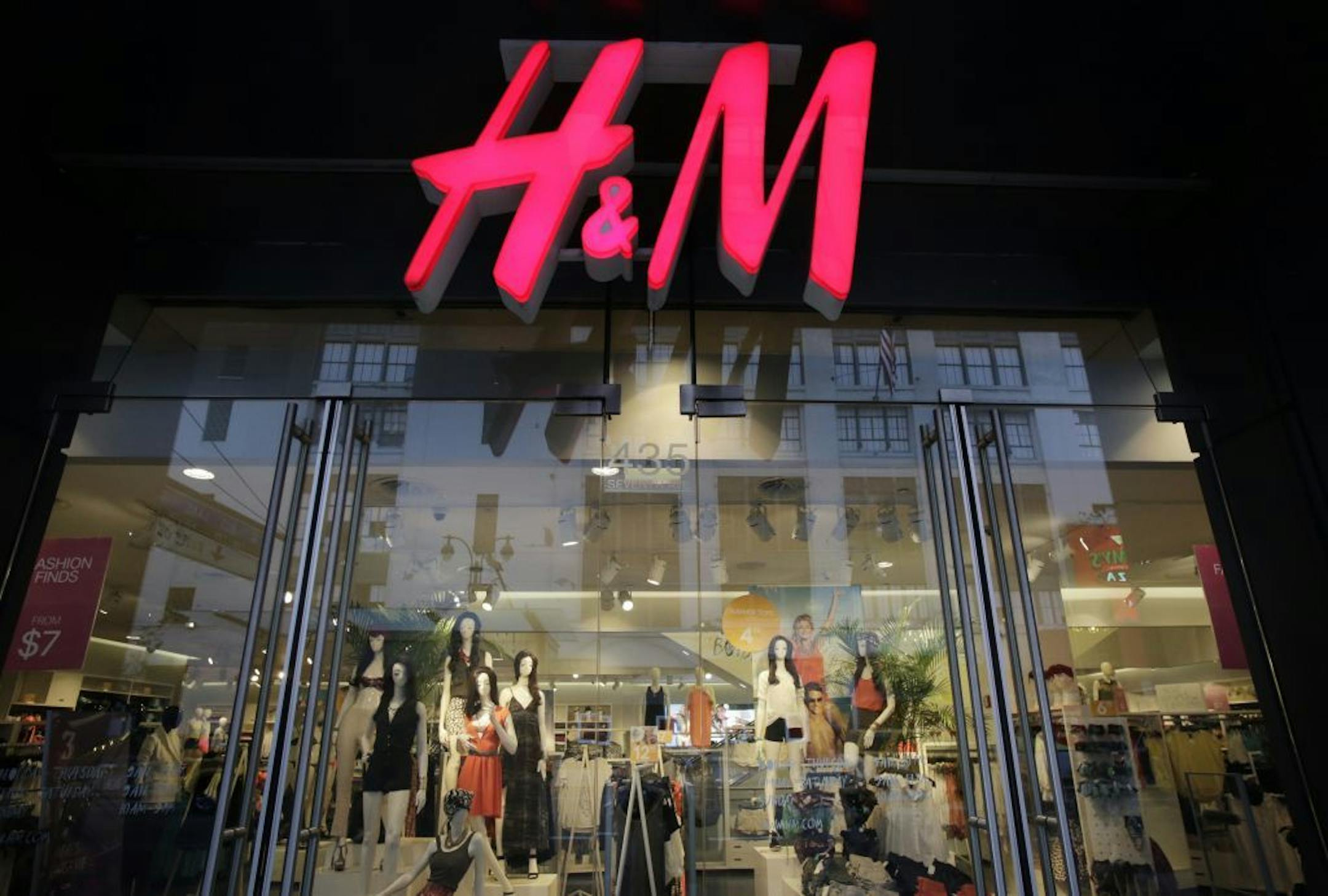 FILE - In this May 31, 2013, file photo, an H&M store is shown in New York. H&M, Hennes & Mauritz reports quarterly earnings in Thursday, March 27, 2014.