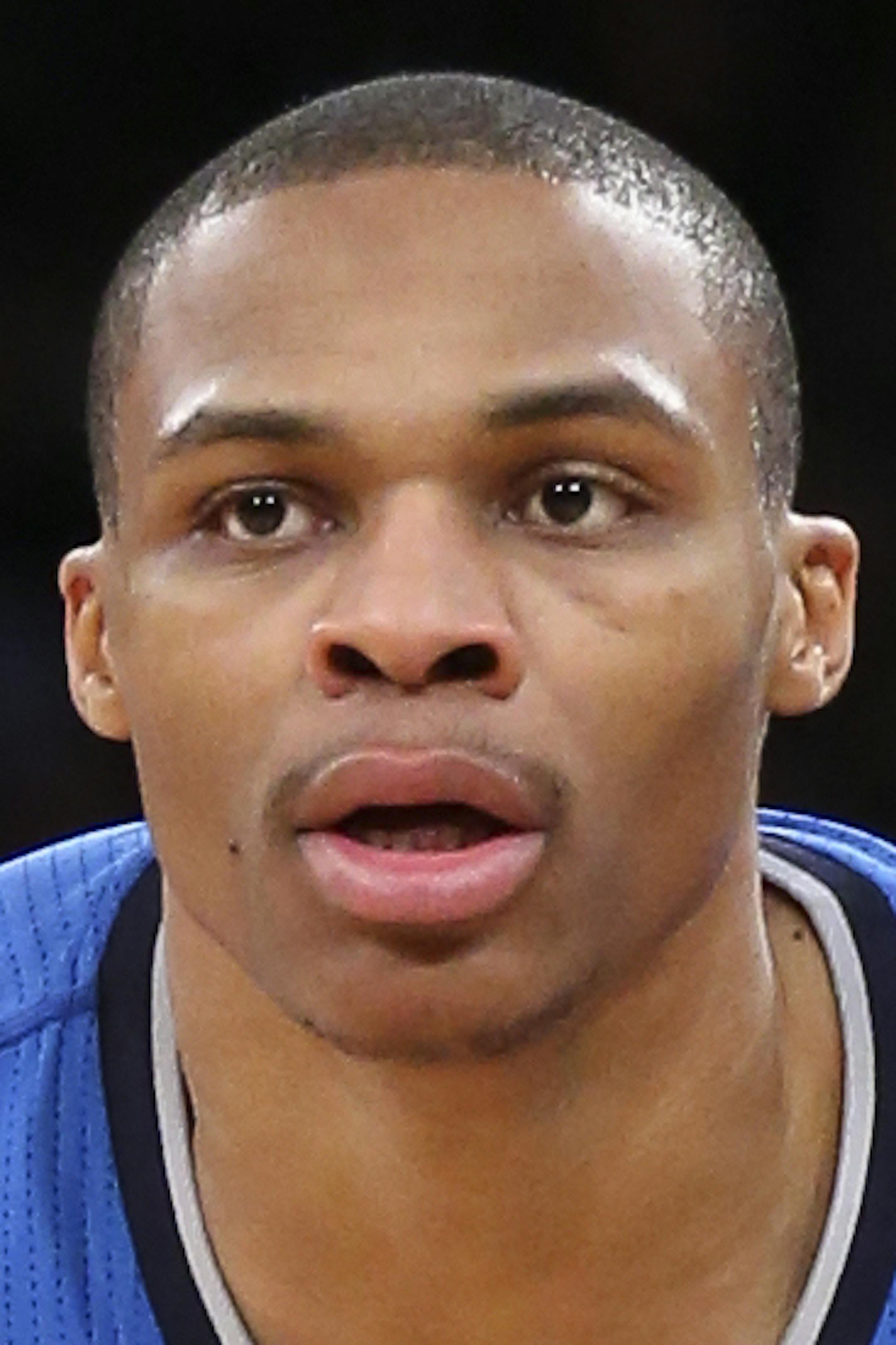 Oklahoma City Thunder guard Russell Westbrook looks to pass during the second half of Thunder's NBA basketball game against the New York Knicks at Madison Square Garden, Wednesday, Dec. 25, 2013, in New York. The Thunder won 123-94. (AP Photo/John Minchillo)