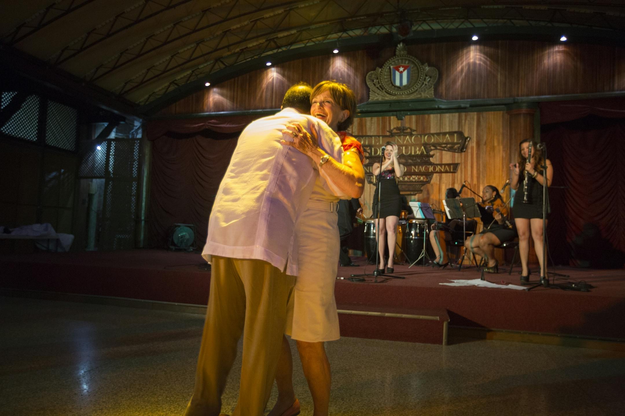 Marilyn Nelson dances with Minnesota Orchestra trumpet player Manny Laureano during dinner at the Hotel Nacional in Havana, Cuba on Wednesday, May 13, 2015.