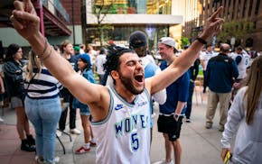 Aboude Elmir screams, “Wolves back baby!” at Kieran’s Irish Pub ahead of the Minnesota Timberwolves playoff game against the Denver Nuggets on F