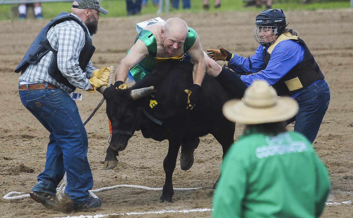 Gene Fraikes of Azle, Texas, center, attempts to mount a steer with assistance from Jake Z. of Minneapolis, left, and Laura Lee of San Antonio, Texas. ] Timothy Nwachukwu &#x2022; timothy.nwachukwu@startribune.com The North Star Regional Rodeo commenced its first full day of action of the three-day event at Dead Broke Arena on Saturday, July 30, 2016 in Hugo, Minnesota. The rodeo, produced by the North Star Gay Rodeo Assocoation, is in its second year back in the saddle after gaining new leaders