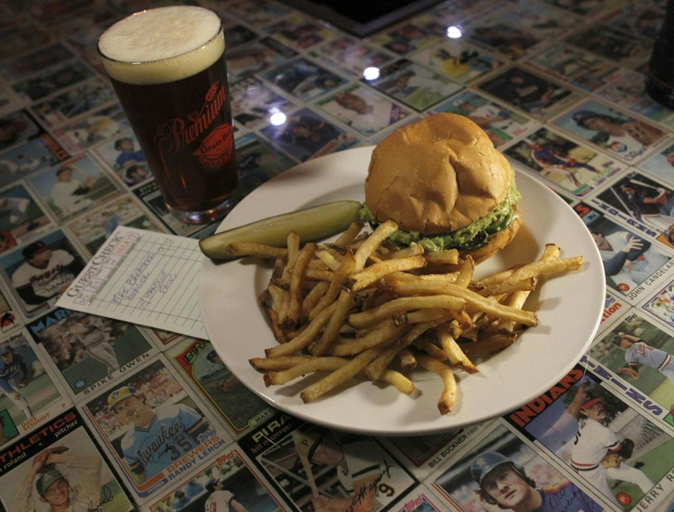 The Bar top made with baseball cards and the stable of tasty bar food and the huge mural painting are all part of the LowBrow charm. A Fire breather burger and hand cut fries.