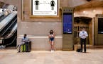 Socially distanced commuters wore face masks at Grand Central Station in Manhattan on Tuesday, July 27, 2021. Revising a decision made just two months