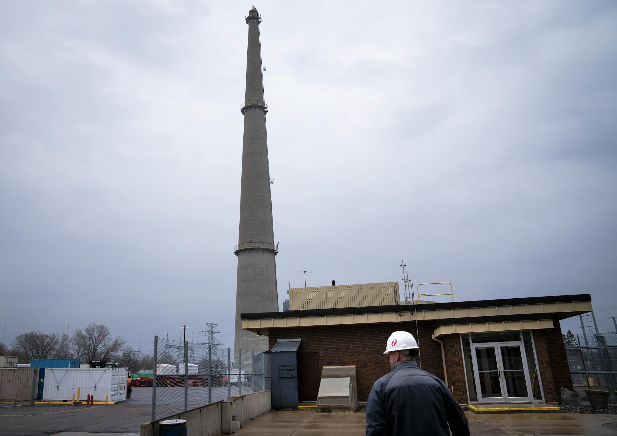 Tom Conboy, general manager fleet operations, walks outside the reactor building while leading a tour of Xcel Energy Monticello Nuclear Generating Plant.