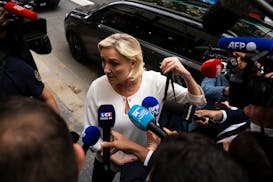 Marine Le Pen, leader the French far-right, arrives at the National Rally party headquarters, Monday, July 1, 2024 in Paris. France's National Rally s