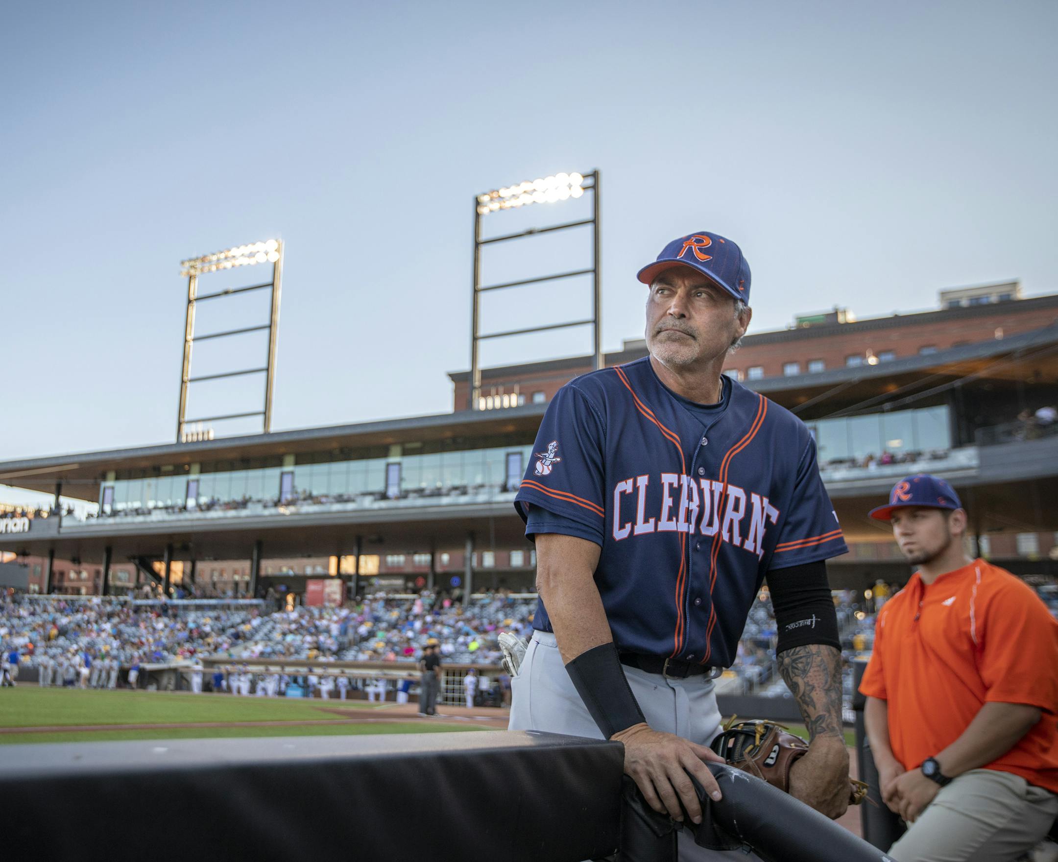 Rafael Palmeiro of the Cleburne Railroaders walks into the dugout during the game. ] LEILA NAVIDI ï leila.navidi@startribune.com BACKGROUND INFORMATION: Rafael Palmeiro, former MLB player and current player with the Cleburne Railroaders, during a game against the St. Paul Saints at CHS Field in St. Paul on Tuesday, July 10, 2018. Palmeiro was injured and didn't play in the game.