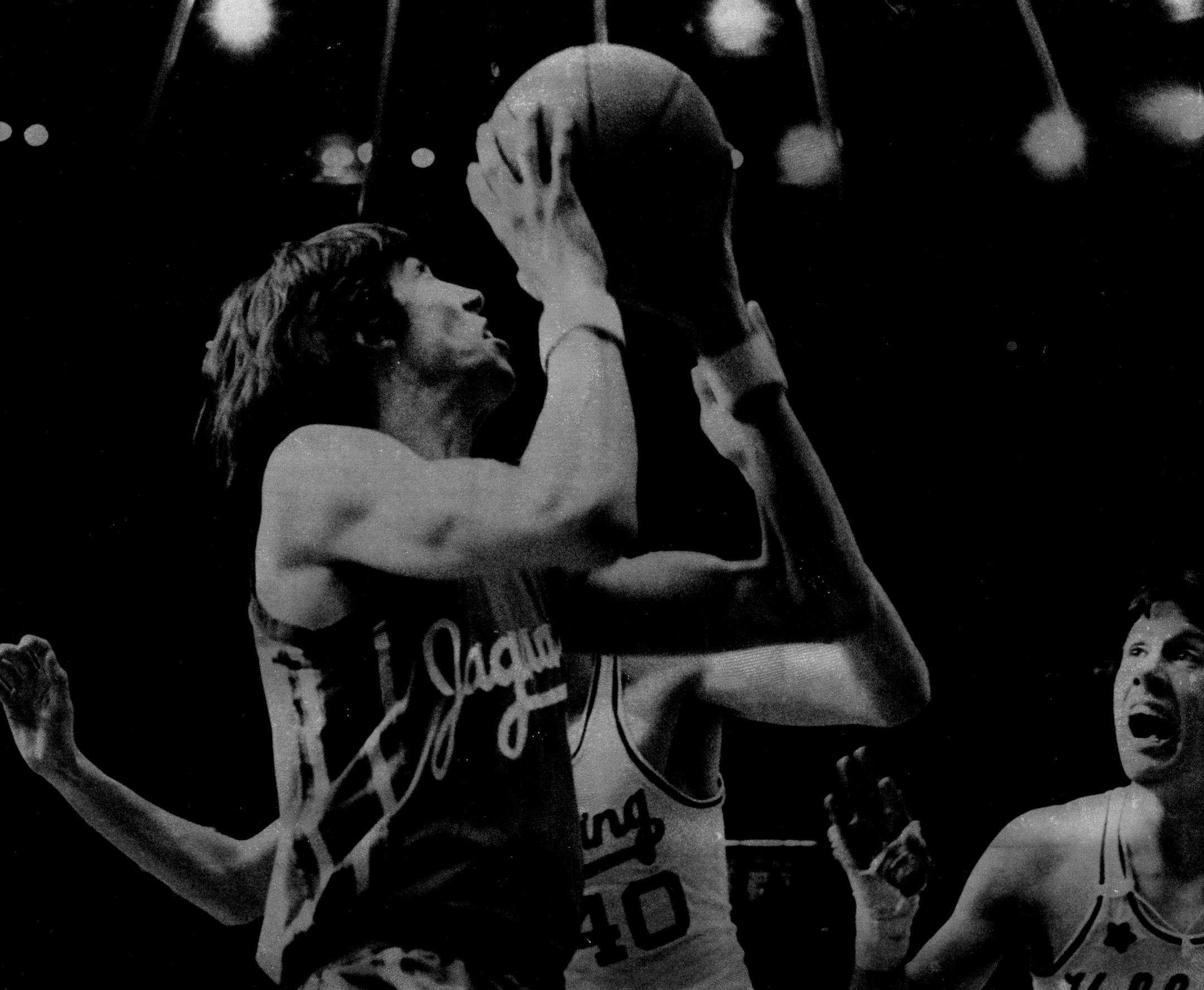 March 22, 1976 Strained determination showing on his face, Jefferson's Steve Lingenfelter drew a bead on another basket as he scored 14 of his 26 points in the fourth quarter to power a 60-51 victory over Hibbing for the Class AA state high school basketball crown Saturday night at the Civic Center. March 20, 1976 March 21, 1976 Pete Hohn, Minneapolis Star Tribune